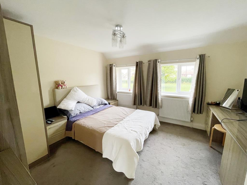 Lot: 57 - THREE-BEDROOM TERRACE HOUSE FOR REPAIR IN POPULAR ESSEX VILLAGE - Bedroom 1 with window to front